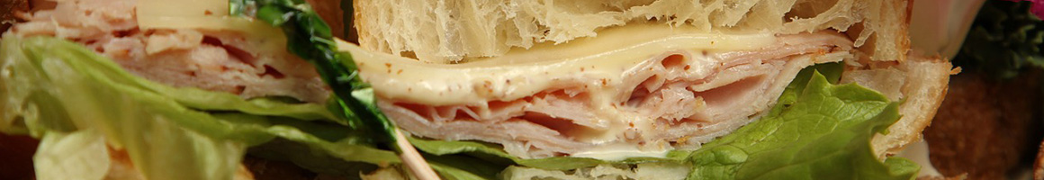 Eating Sandwich at Super Subs Etc restaurant in Miami, FL.
